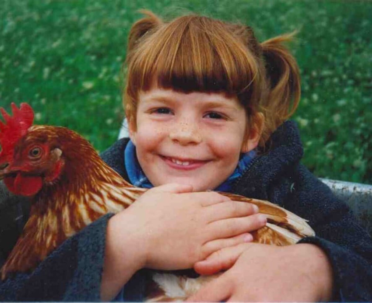 Katharina con un gallo